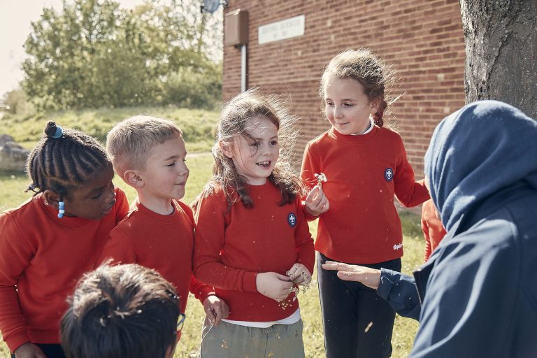 Squirrels exploring outdoors with their leader